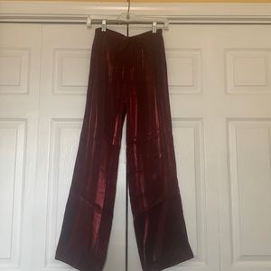 Girls elastic waist shimmery shiny somewhat burgundy in color pants